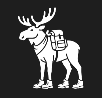 The vamoose moose, wearing a backpack and hiking boots